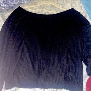 Cute long sleeve cropped top. Beaded back open